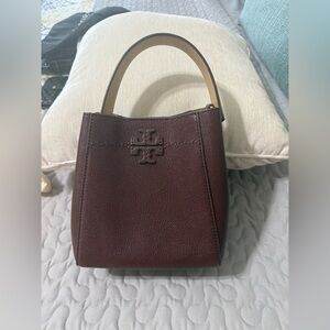 Tory Burch McGraw textured small bucket bag
color: wine
